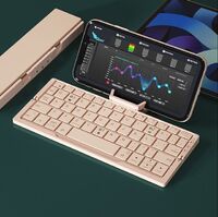 Hot-sell Mini foldable keyboard tablet notebook computer office portable mobile phone wireless folding keypad fold keyboard