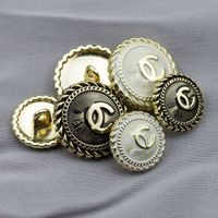 Wholesale Zinc Alloy design brand cc button accessory for ladies' coat