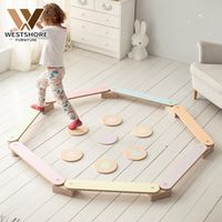 Children stones with wooden balancing beam for children