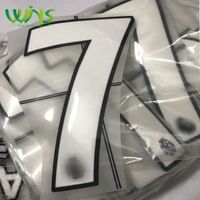 Ironing the letters and numbers of the jersey