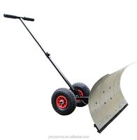 Manual wheeled snow shovel