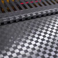 Carbon fiber spread tow cloth