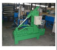 Tire cutting machine for recycling used tires
