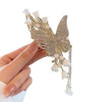 New Korean version of female hair claw hair clip fashion flower butterfly tassel hair clip catch big shark clip headdress hair accessories